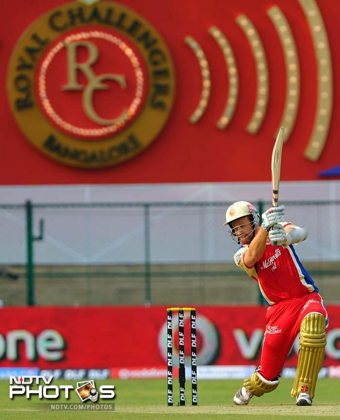 Andrew McDonald (not in picture) fought well for his 30 but it was AB de Villiers who anchored the innings for Bangalore against a torrid bowling spell. (AFP PHOTO/Manjunath KIRAN) IPL 5: Bangalore ease past Delhi