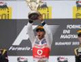Lewis Hamilton takes the chequered flag at the Hungarian Grand Prix