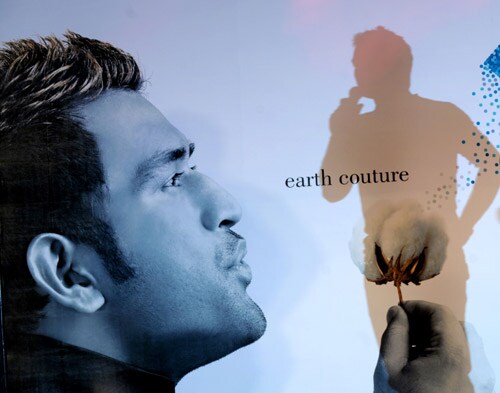 The shadow of Mahendra Singh Dhoni falls upon an advertising campaign board as he announces the details of the city's second Fashion Week in Kolkata. (AFP Photo) Dhoni's fashion statement