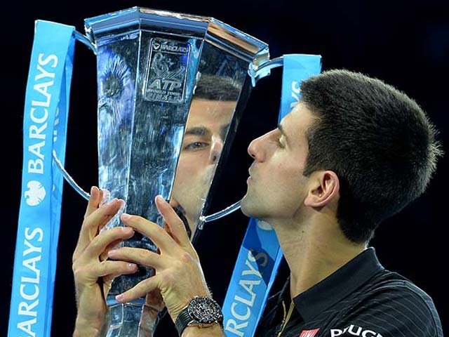 Photo : Djokovic Completes Three-Peat of ATP World Tour Titles After Federer's Withdrawal