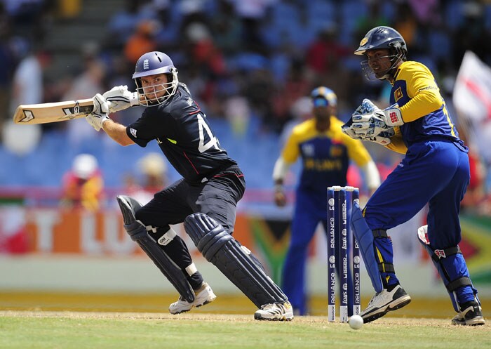 English batsman Michael Lumb plays a shot past Sri Lankan captain Kumar Sangakkara during the ICC World Twenty20 first semifinal match. (AFP Photo) WT20: Eng vs SL