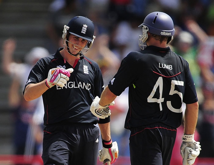Michael Lumb and Craig Kieswetter celebrate a boundary during the ICC World Twenty20 first semifinal match between Sri Lanka and England at the Beausejour Cricket Ground. (AFP Photo) WT20: Eng vs SL