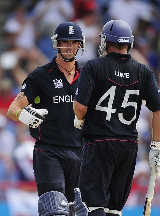 Kevin Pietersen and Michael Lumb celebrate a boundary during the ICC World Twenty20 first semifinal match between Sri Lanka and England. (AFP Photo) WT20: Eng vs SL