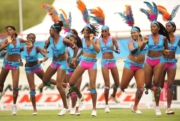 Dancers perform during the ICC World Twenty20 first semifinal match between Sri Lanka and England at the Beausejour Cricket Ground. (AFP Photo) WT20: Eng vs SL