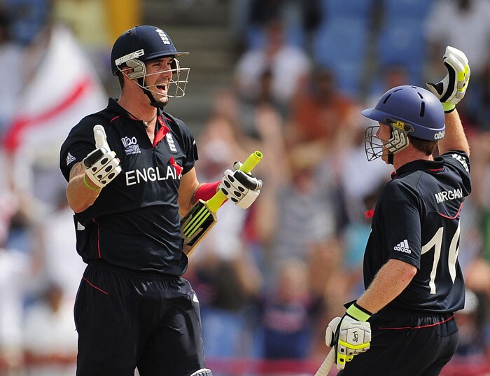Kevin Pietersen and Eoin Morgan celebrate at the end of the ICC World Twenty20 first semifinal match between Sri Lanka and England at the Beausejour Cricket Ground. England won by 7 wickets to qualify for the final. (AFP Photo) WT20: Eng vs SL
