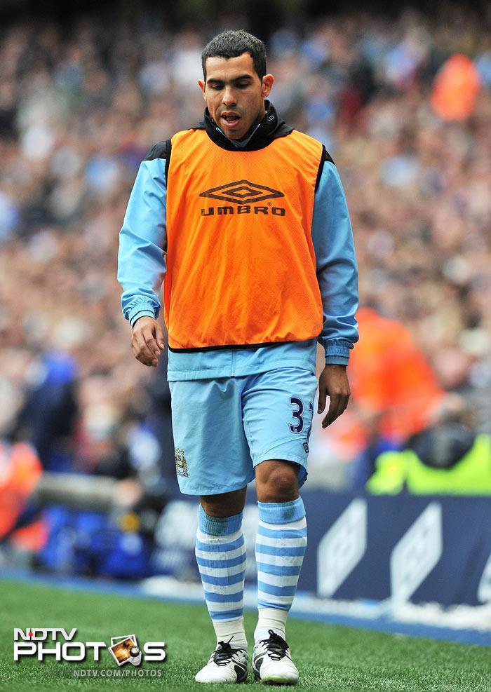 Speculation regarding Carlos Tevez intensified as he was kept on the bench for the entire 90 minutes. (AFP Photo) EPL Match-Week 6