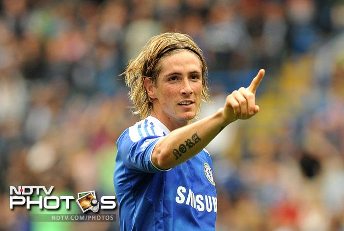 Fernando Torres showed a glimpse of what had made Chelsea pay 50 million pounds for him as he opened the scoring for the blues. (AFP Photo) EPL Match-Week 6