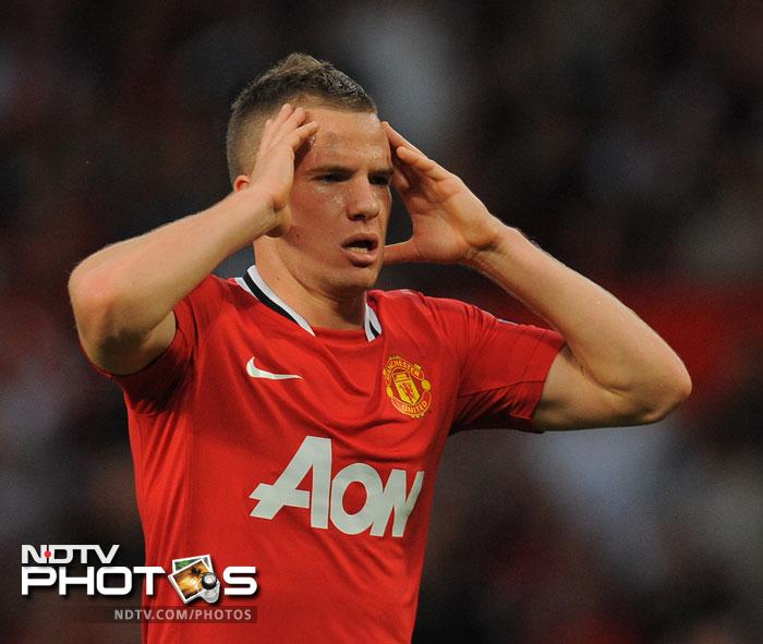While attacking, another young gun Tom Cleverley provided some telling balls into the box. He, alongside the quick legs of Nani and Ashley Young proved to be a menace in midfield for the Tottenham side which hadn't won at Old Trafford in the last 20 appearances. (AFP Photo) EPL 2011: Match-Week 2