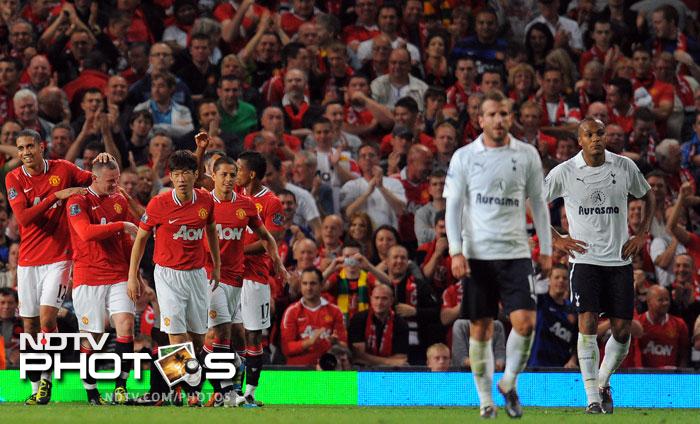 Manchester United and Manchester City continued to do justice to the claims of a two horse race. The two derby rivals registered comfortable wins to establish a top two finish to the week. (AFP Photo) EPL 2011: Match-Week 2