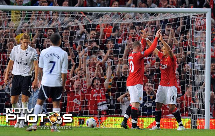 Wayne Rooney wrapped up the match with a neat finish to leave Brad Friedel in no man's land and Tottenham pondering on how to maximise the last week of the Transfer Window. (AFP Photo) EPL 2011: Match-Week 2