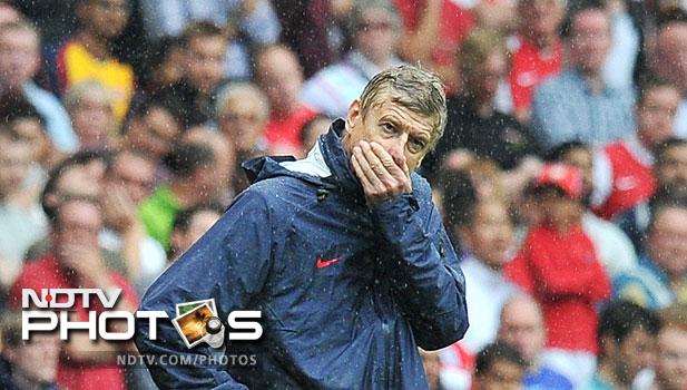 Liverpool then had a stroke of fortune and got the lead courtesy a clearance that deflected off Aaron Ramsey into the Gunners' net. Luis Suarez applied the finishing touches to pile on the misery of Arsene Wenger. (AFP Photo) EPL 2011: Match-Week 2