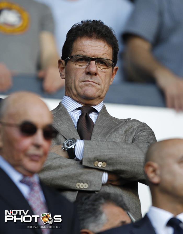 England's Manager Fabio Capello attends the match during an English Premier League football match between Tottenham Hotspur and Arsenal. (AFP Photo) EPL 2011: Match-Week 7