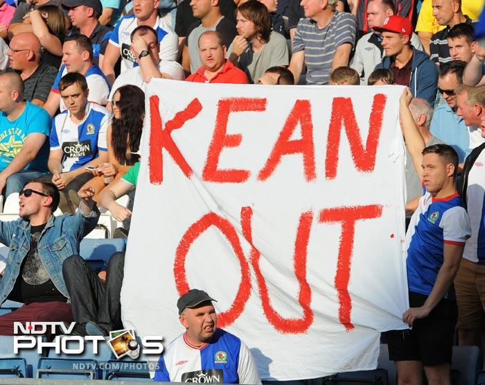Blackburn Rovers fans hold a 'Kean out' banner in protest against their manager Steve Kean. (AFP Photo) EPL 2011: Match-Week 7