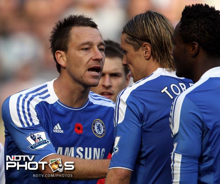 The match seemed to have been heading towards a draw, a fitting result considering the performances of the two teams. But it wasn't to be as a slip from John Terry turned the tables around. (AFP Photo) EPL 2011: Match-Week 10