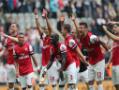 Photo : Arsenal seal Champions League berth, Fergie bows out
