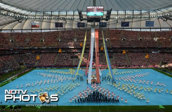 As opposed to most high profile tournaments, the Euro 2012 opening ceremony was just 12 minutes long but was a spectacle to behold. (AFP PHOTO/GABRIEL BOUYS) Euro 2012 gets underway with opening ceremony