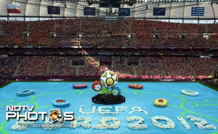 Euro 2012 kicked-off with a short opening ceremony at Poland's National Stadium on Friday. (AFP PHOTO/GABRIEL BOUYS) Euro 2012 gets underway with opening ceremony