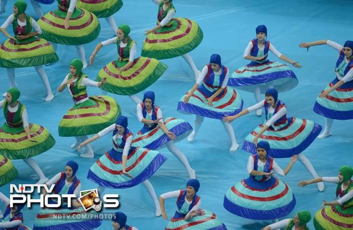 Dancers perform during the opening ceremony prior to the kick off of the Euro 2012 football championships match between Poland and Greece. (AFP PHOTO/GABRIEL BOUYS) Euro 2012 gets underway with opening ceremony