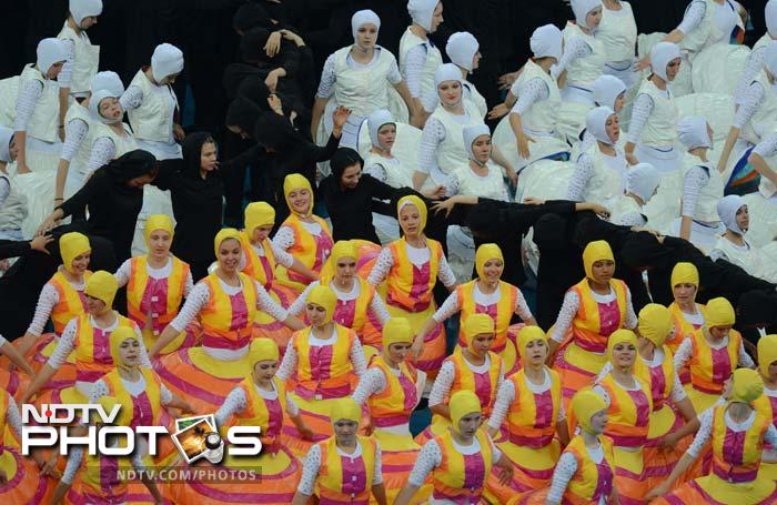 Dancers perform during the opening ceremony prior to the kick off of the Euro 2012 football championships match between Poland and Greece. (AFP PHOTO/GABRIEL BOUYS) Euro 2012 gets underway with opening ceremony
