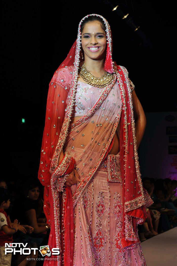 Badminton sensation Saina Nehwal showed that her skills were as good on the ramp as they were on court when she attended Hyderabad Fashion Week.