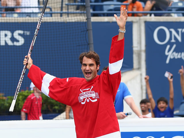 Roger Federer Has a Ball on the Hockey Rink