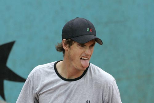 Briitain's Andy Murray grimaces during a training session at the Roland Garros stadium in Paris. The French Open tennis tournament starts on Sunday. French Open 2008