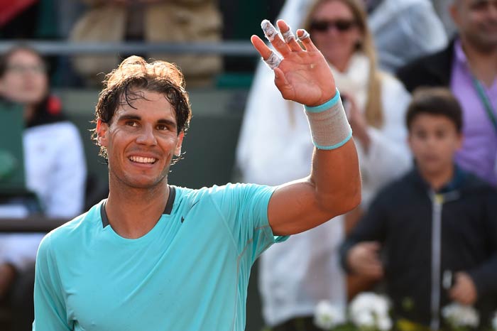 Nadal, Djokovic, Sharapova advance at French Open