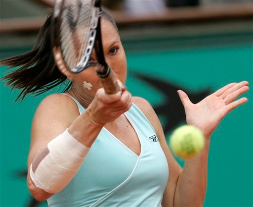 Serbia's Jelena Jankovic returns the ball to compatriot Ana Ivanovic during their semifinal match of the French Open tennis tournament on Thursday, June 5, 2008 at the Roland Garros stadium in Paris. French Open 2008, Day 12