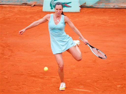 Serbia's Jelena Jankovic kicks the ball as she plays compatriot Ana Ivanovic during their semifinal match of the French Open tennis tournament on Thursday, June 5, 2008 at the Roland Garros stadium in Paris. French Open 2008, Day 12