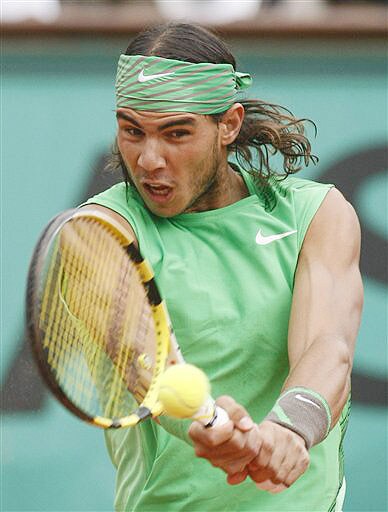 Defending champion Spain's Rafael Nadal returns the ball to compatriot Fernando Verdasco during their fourth round match of the French Open on June 1, 2008 at the Roland Garros stadium in Paris. (AP Photo) French Open 2008, Day 8