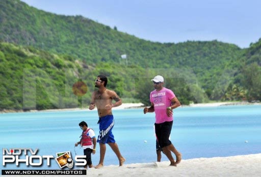 Some of the Indian players like Virat Kohli (left) and Harbhajan Singh made the most of the sun, sand and the water. A look at the Caribbean offerings this summer. (AFP Photos) Not just cricket