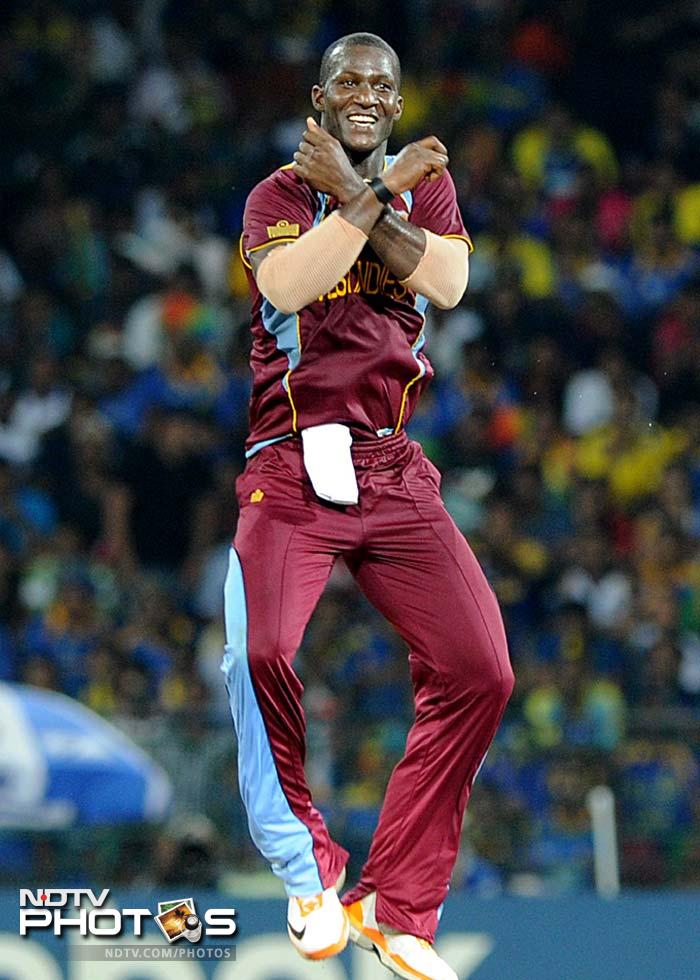 Gayle is not the only West Indian to go the 'Gangnam' way. Skipper Darren Sammy grooves it up as he expresses his joy at taking a wicket.
