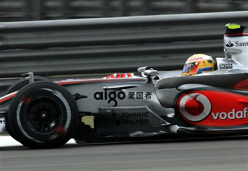 Hamilton speeds his McLaren-Mercedes during a practice session for Sunday's Formula One Chinese Grand Prix. Hamilton awaits verdict