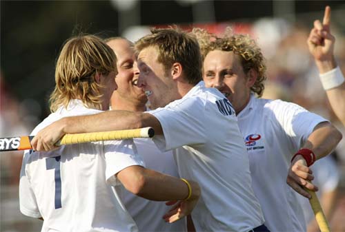 Great Britain's Barry Middleton (centre) celebrates with team-mates after scoring against India in the final game of hockey Olympic qualifiers in Santiago on Sunday. India lose hockey qualifier