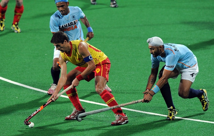 The match started on a fast note with the ball travelling from one end to the other right from the onset. Spain, however, was the more dominant force as they earned four scoring chances in the first 20 minutes. (AFP Photo) Spain trounce India 5-2