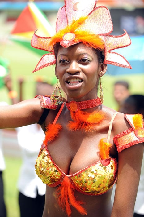 An artist jives while singing along with reggae singer Shaggy before the opening match of the ICC World Twenty20 tournament at the Providence Stadium in Guyana. (AFP Photo) ICC WT20 opening ceremony