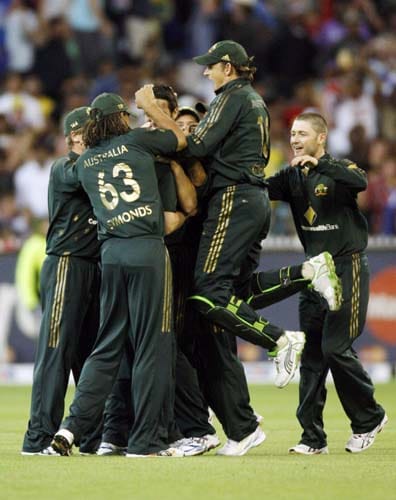 Australian players celebrate the wicket of India's Sachin Tendulker during their one-day international cricket match at the Melbourne Cricket Ground on Sunday, February 10, 2008. 4th Match: India vs Australia