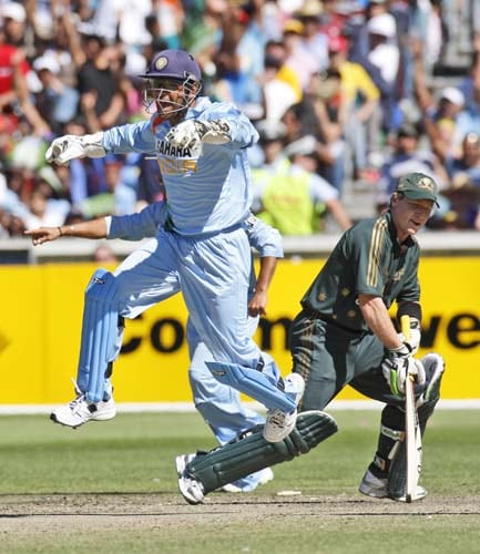 MS Dohni, left, celebrates the stumping of Brad Haddin from Australia during their one-day international cricket match at the Melbourne Cricket Ground on Sunday, February 10, 2008.Irfan Pathan, center, and MS Dhoni celebrate the wicket of Brett Lee, left, from Australia during their one-day international cricket match at the Melbourne Cricket Ground on Sunday, February 10, 2008. 4th Match: India vs Australia