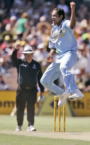 Irfan Pathan jumps to celebrate taking the wicket of Michael Hussey for 5 runs in their one-day international match at the Adelaide Oval on Sunday, February 17, 2008. 7th Match: India vs Australia