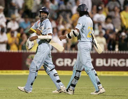 Manuf Patel, left, and Ishant Sharma walk off after Australia won their one-day international match at the Adelaide Oval on Sunday, February 17, 2008. Australia won by 50 runs after India are all out for 153. 7th Match: India vs Australia
