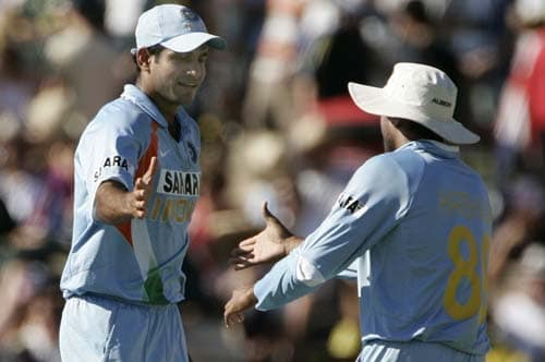 Harbhajan Singh, right, shakes hands with teammate Irfan Pathan after Pathan took 4 wickets against Australia in their one-day international cricket match at the Adelaide Oval on Sunday, February 17, 2008. Australia made 203 in their innings. 7th Match: India vs Australia