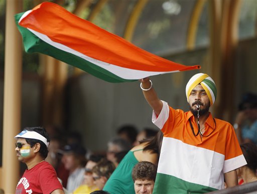 An Indian cricket fan cheers on the Indian women's cricket team during their Women's World Cup cricket match against Australia at North Sydney Oval in Sydney on Saturday, March 14, 2009. (AP Photo) WWC: India beat Aus by 16 runs