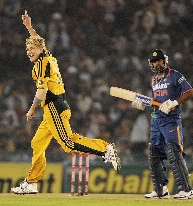 Australia's Shane Watson reacts after taking the wicket of India's Praveen Kumar during the fourth ODI match at the Punjab Cricket Association Stadium in Mohali. (AFP Photo) Australia bounce back against India
