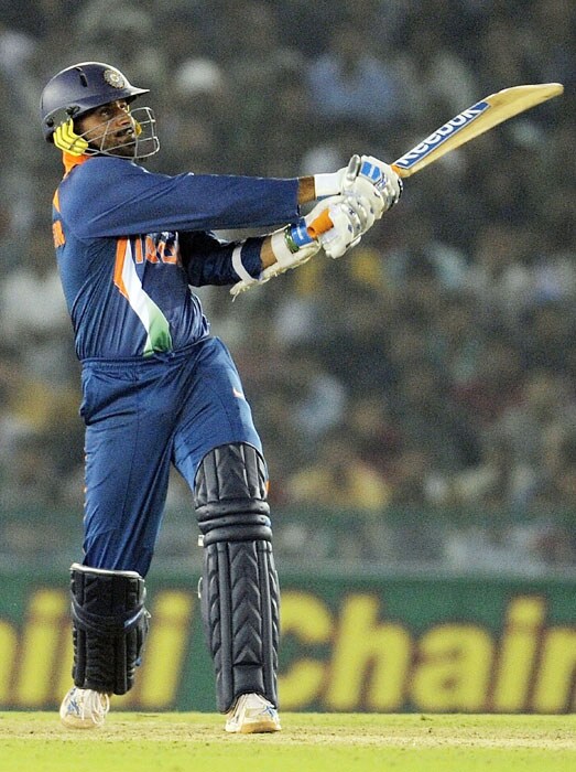 India's Harbhajan Singh plays a shot during the fourth ODI match at Mohali on Tuesday. (AFP Photo) Australia bounce back against India