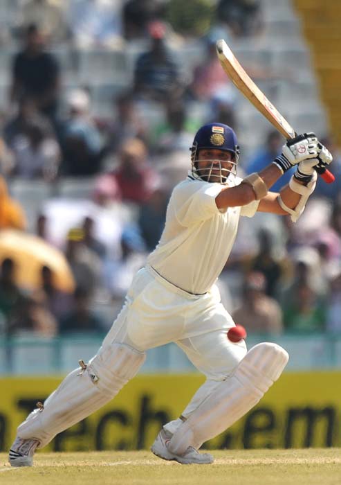 Sachin Tendulkar plays a shot during the third day of opening Test between India and Australia in Mohali. (AFP Photo) IND vs AUS: 1st Test, Day 3