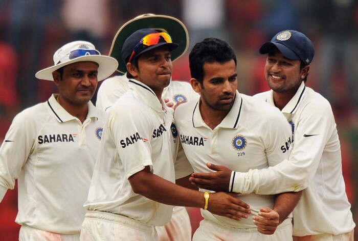 Zaheer Khan celebrates with teammates the wicket of Ricky Ponting during the fourth day of the second Test between India and Australia at M.Chinnaswamy Stadium in Bangalore. (AFP Photo) IND vs AUS: 2nd Test, Day 4
