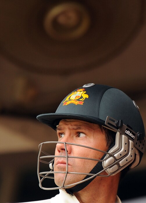 Ricky Ponting walks back to the dressing room after loosing his wicket during the fourth day of the second Test between India and Australia at M.Chinnaswamy Stadium in Bangalore. (AFP Photo) IND vs AUS: 2nd Test, Day 4