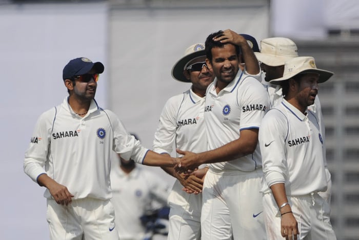 Gautam Gambhir and Virender Sehwag congratulate Zaheer Khan as Sachin Tendulkar looks on during the fourth day of the second Test match in Dhaka. (AFP Photo) India win Test series