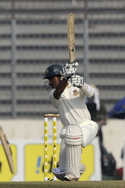 Mohammad Ashraful plays a shot during the fourth day of the second Test match in Dhaka. (AFP Photo) India win Test series