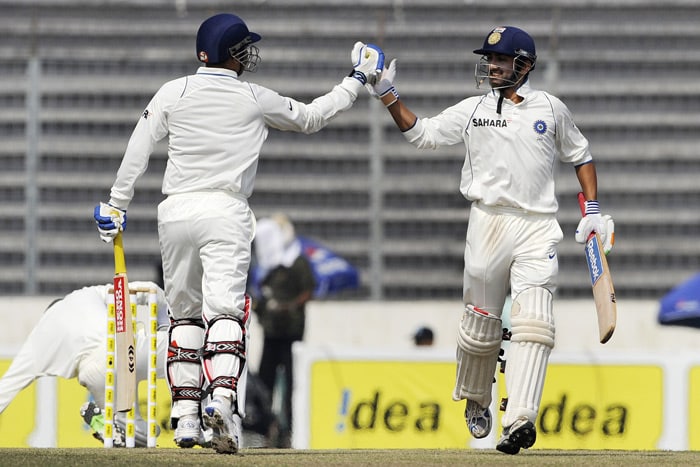 Virender Sehwag and teammate Gautam Gambhir celebrate after defeating Bangladesh during the fourth day of the second Test match in Dhaka. (AFP Photo) India win Test series